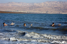 Author afloat in Dead Sea